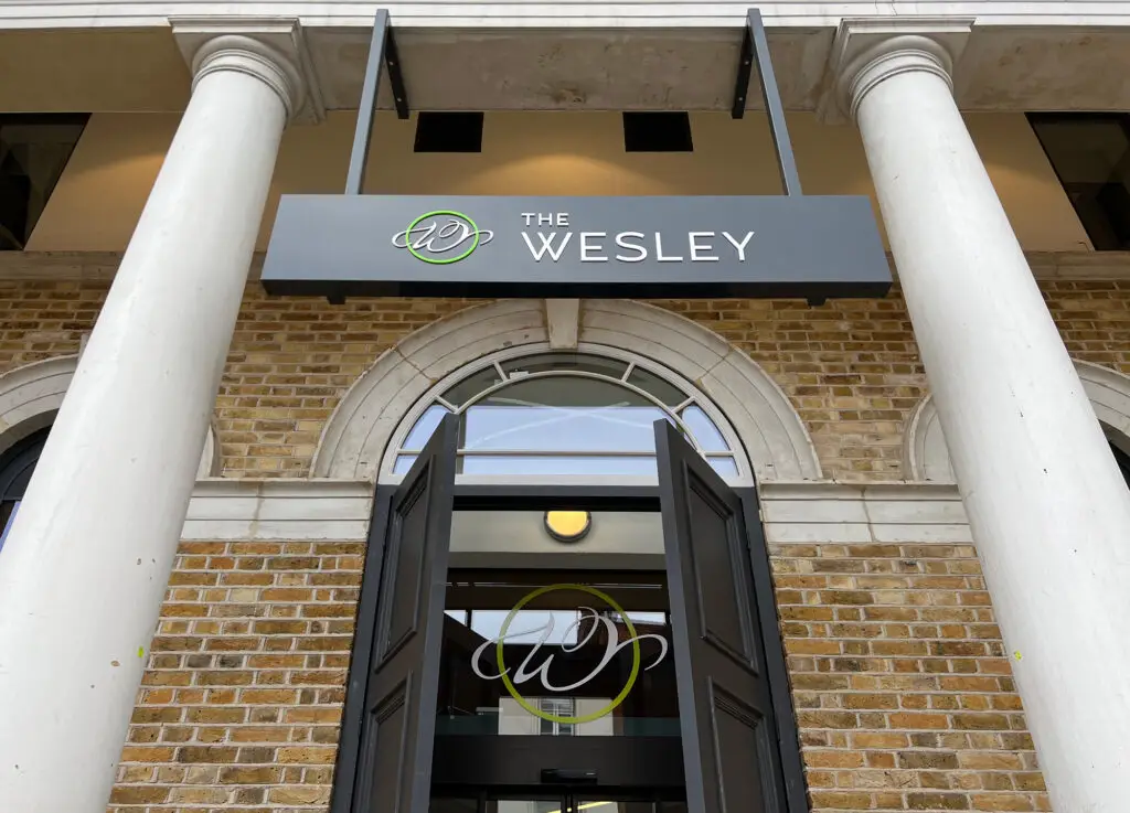 The Wesley Camden hotel exterior with heritage signage designed by Oracle Creative